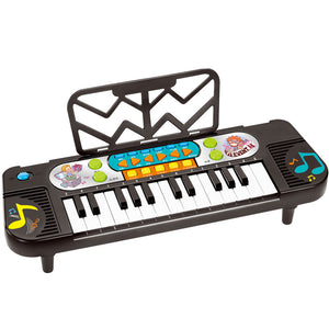 Children's toy keyboard with colorful buttons and a stand on a white background