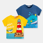 Two children's t-shirts with lighthouse and whale designs on a white background